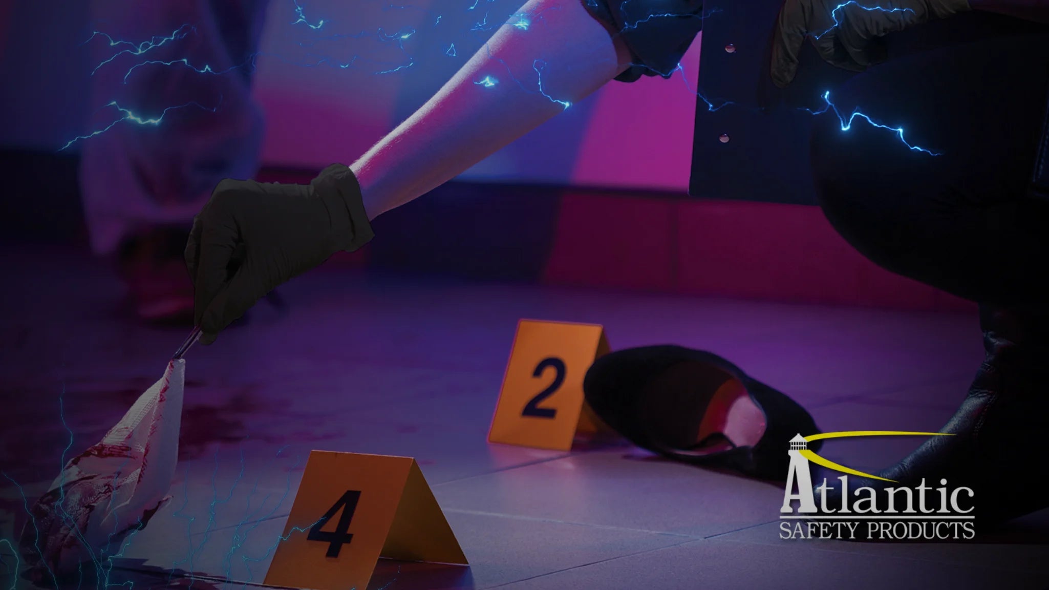 law enforcement officer wearing black nitrile gloves picking up and evidence from a crimescene