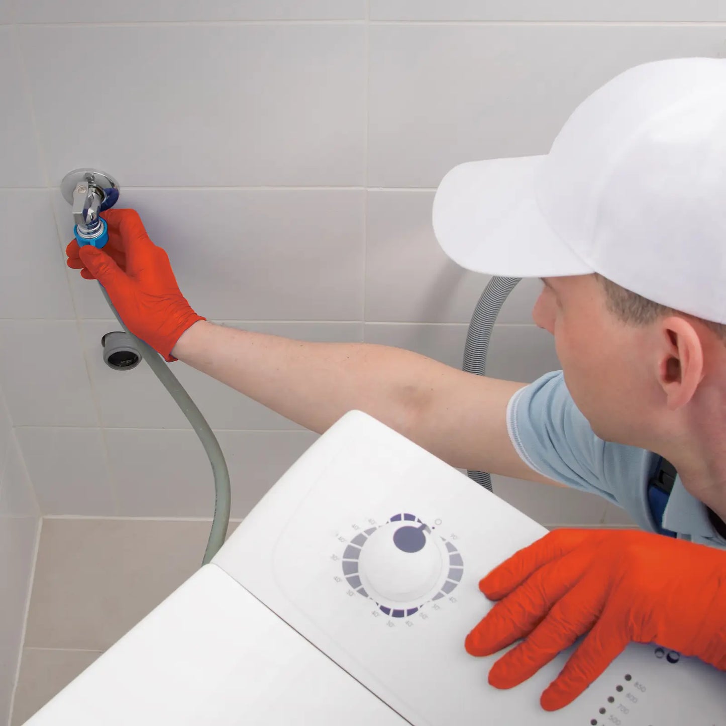 Plumber using 8 Mil-Nitrile-Gloves